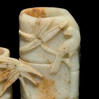 A Chinese Mottled Celadon and Russet Jade 'Double-Bamboo' Vase 青玉仿竹雙聯瓶