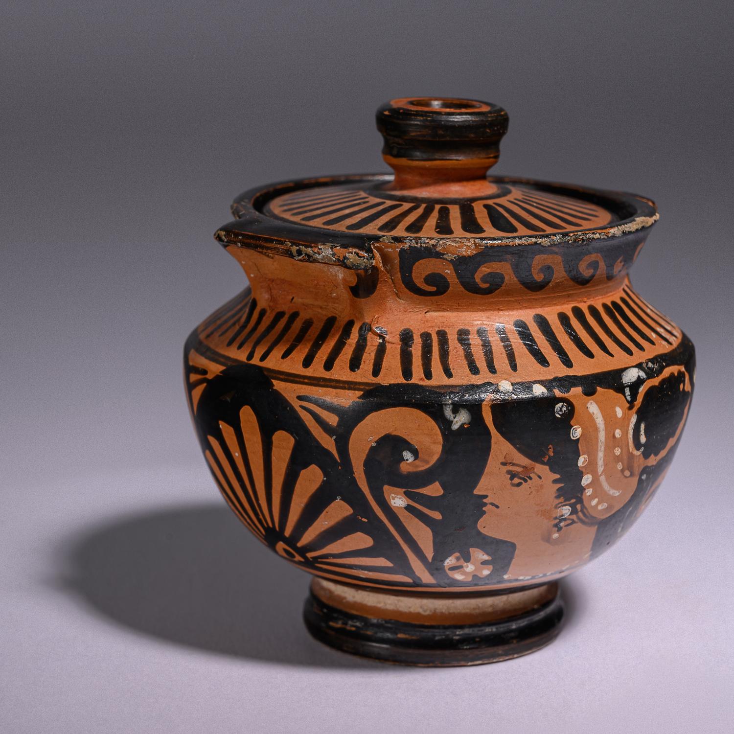 An Apulian Red-Figured Lidded Pyxis
