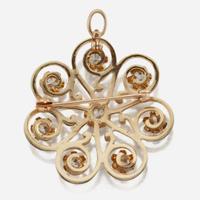 A 14K yellow gold and diamond pendant/brooch