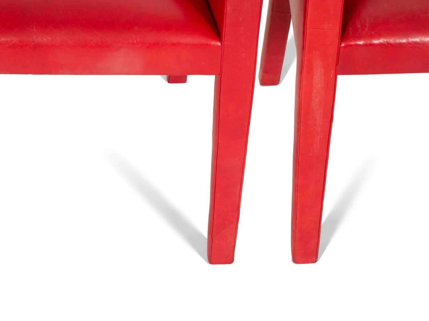 A Set of Four Contemporary Red Leatherette Upholstered Arm Chairs