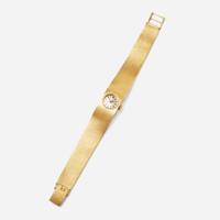 An 18K Yellow Gold Ladies Tissot Watch