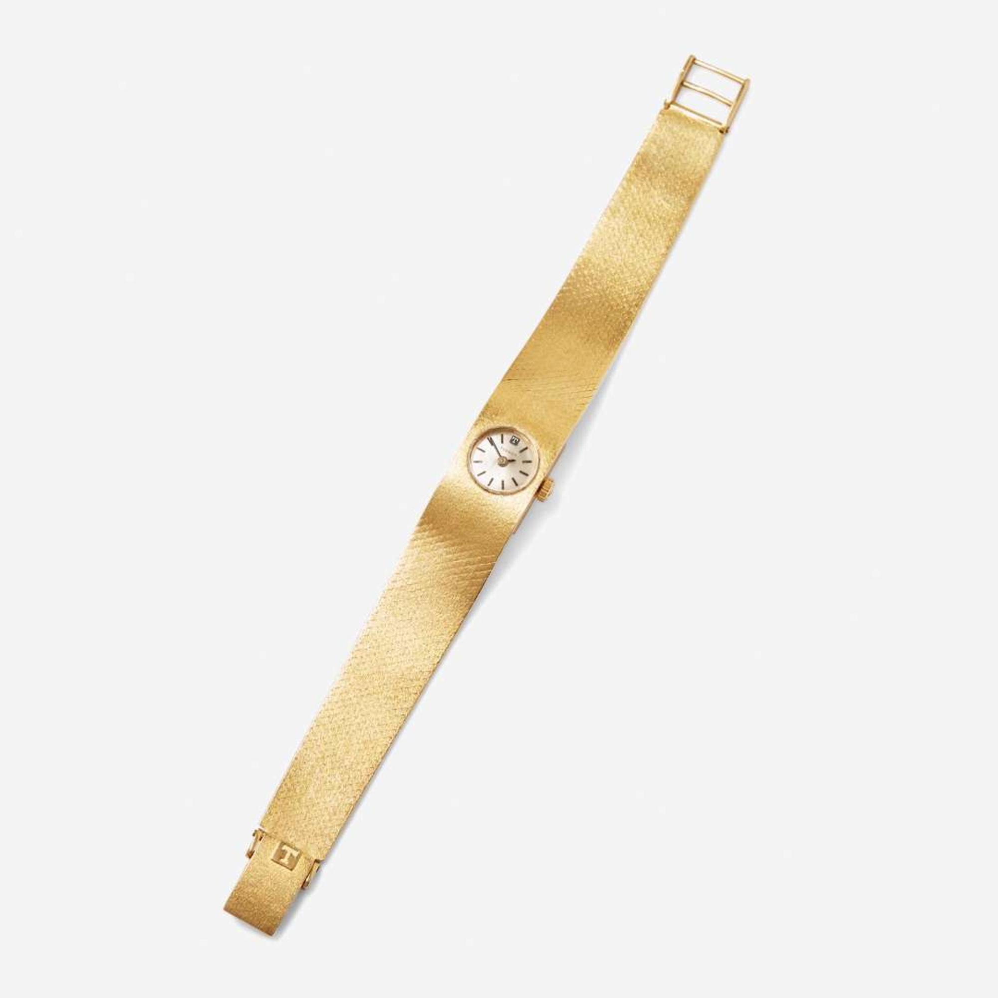An 18K Yellow Gold Ladies Tissot Watch