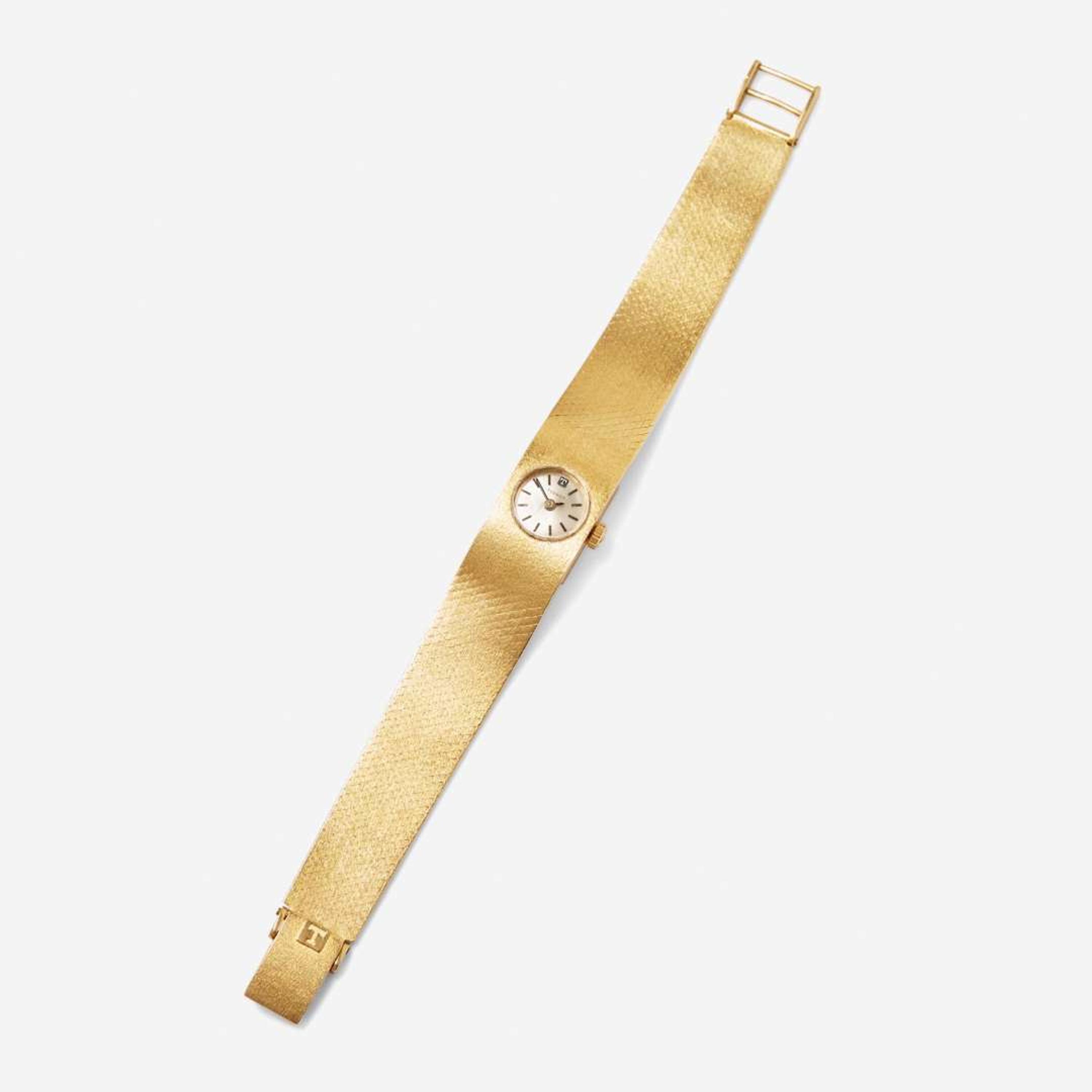An 18K Yellow Gold Ladies Tissot Watch