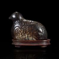 A Chinese dark blackish-brown and grey jade carving of a quail 玉雕鹧鸪 Ming to early Qing dynasty ????