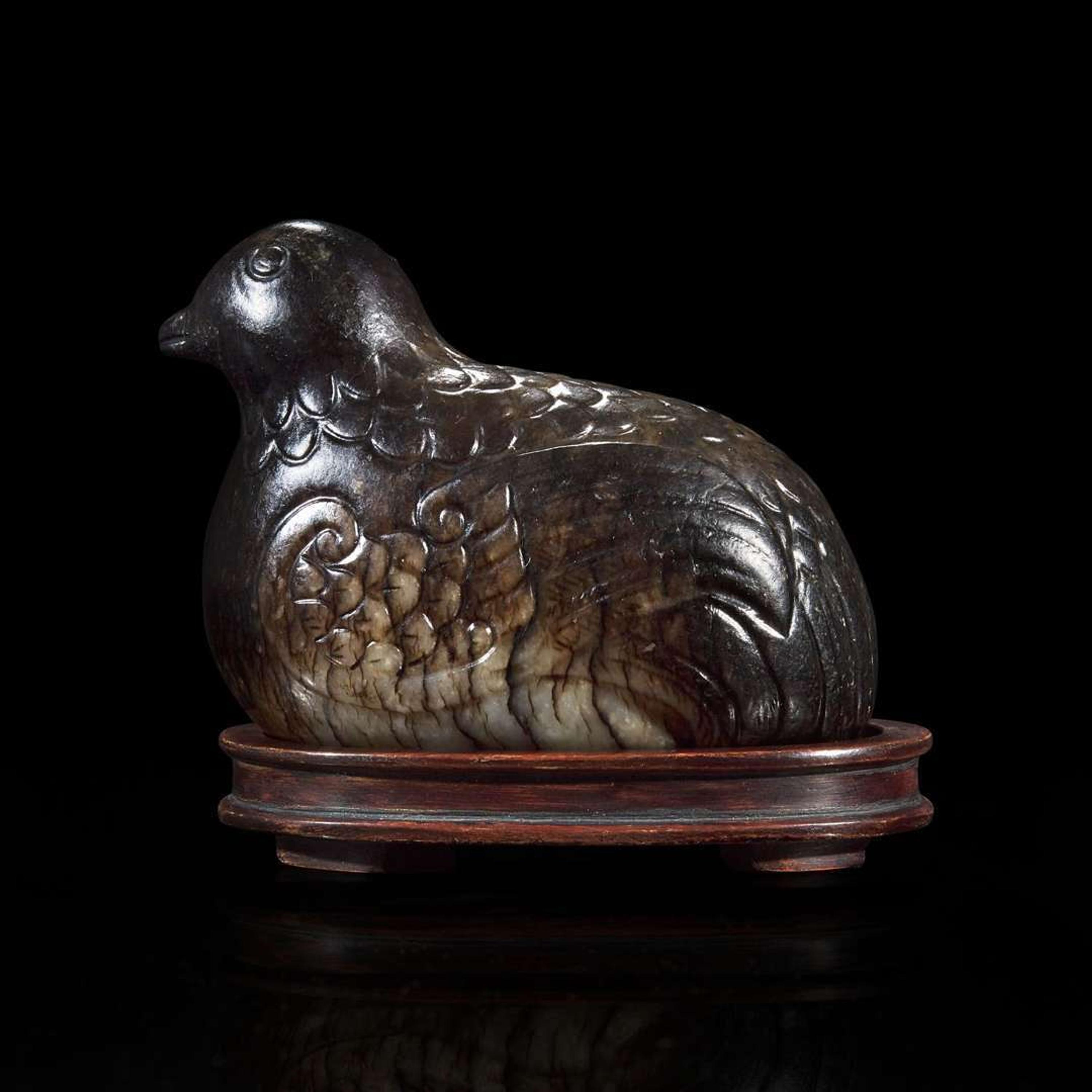 A Chinese dark blackish-brown and grey jade carving of a quail 玉雕鹧鸪 Ming to early Qing dynasty ????