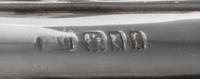 A Pair of Queen Anne Style Silver Candlesticks, Crichton Bros., London, 1919, each of square baluster form with weighted base.