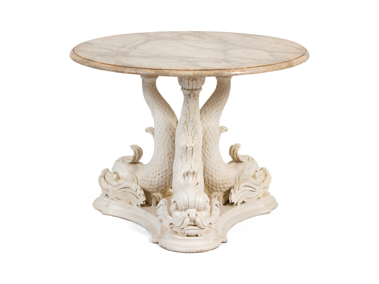 A Carved and White Painted Circular Dolphin Base Table — 20TH CENTURY