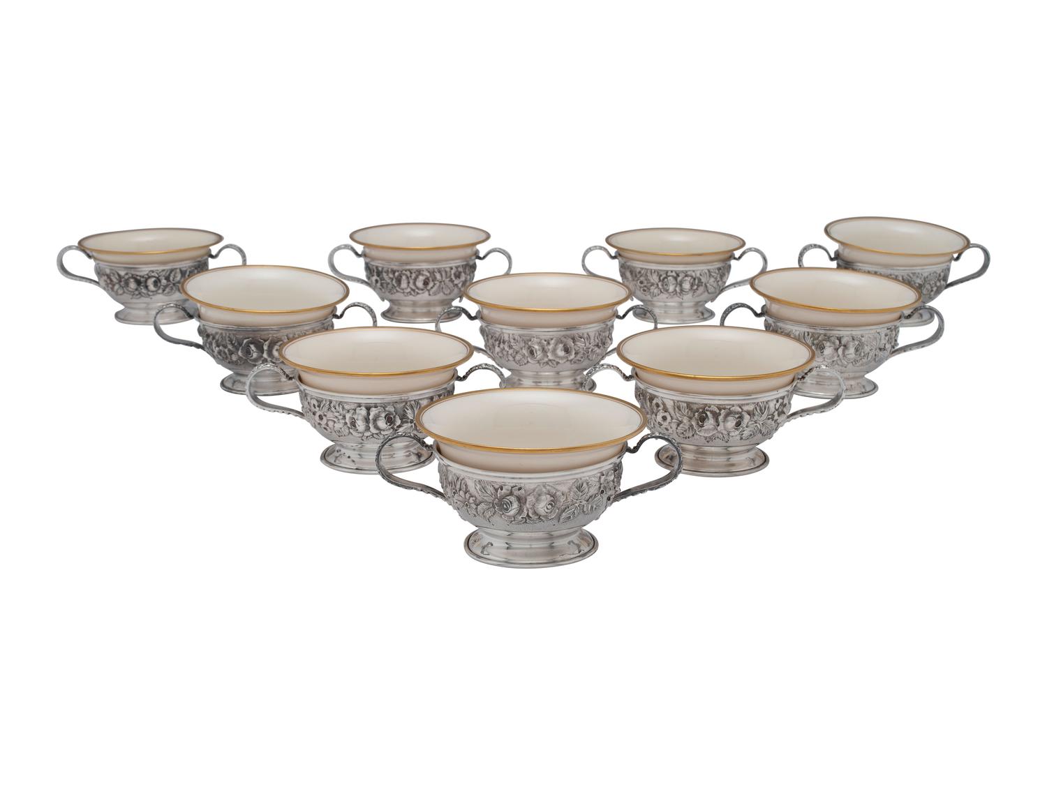 Thirteen American Repousse Silver Bouillon Holders