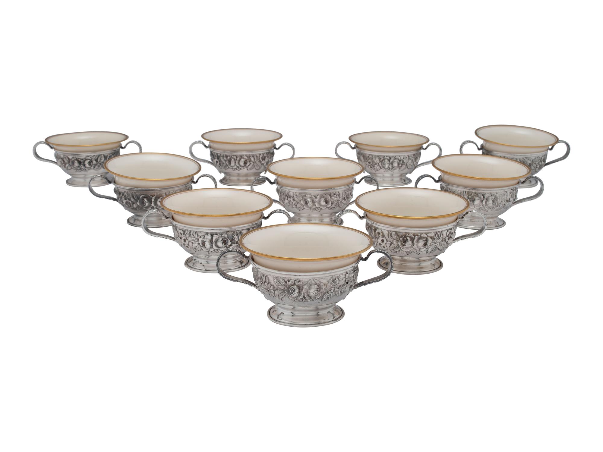 Thirteen American Repousse Silver Bouillon Holders