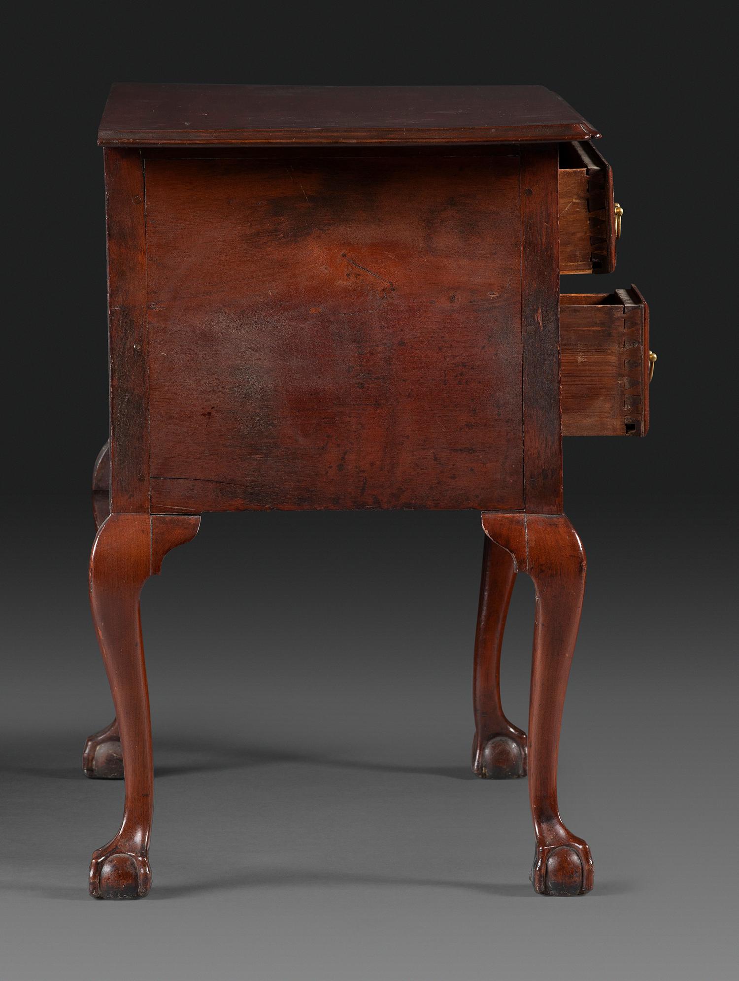 A Chippendale Fan-Carved Walnut Claw-and-Ball Foot Dressing Table