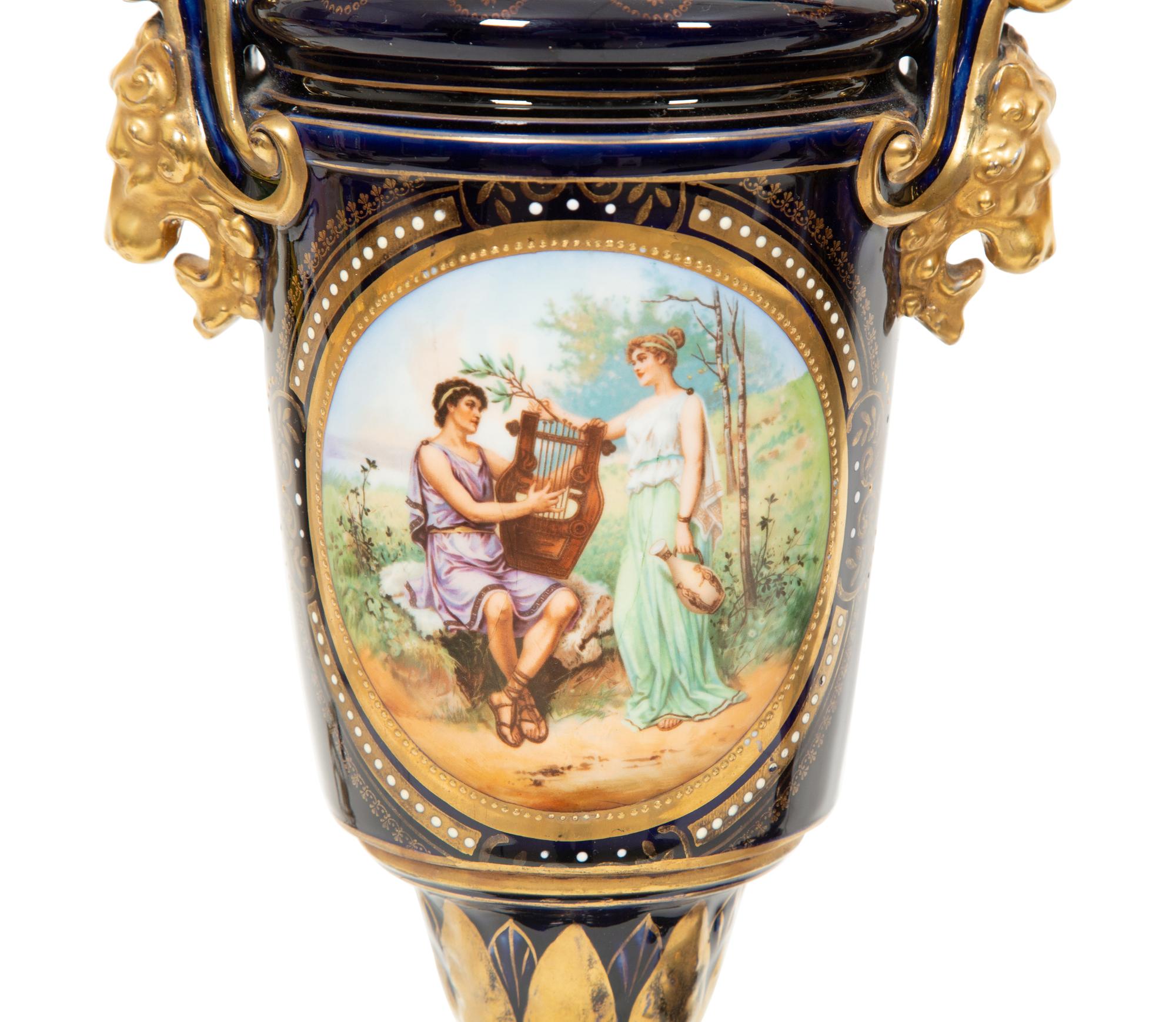 A Pair of Sèvres Style Porcelain Urns Mounted as Lamps