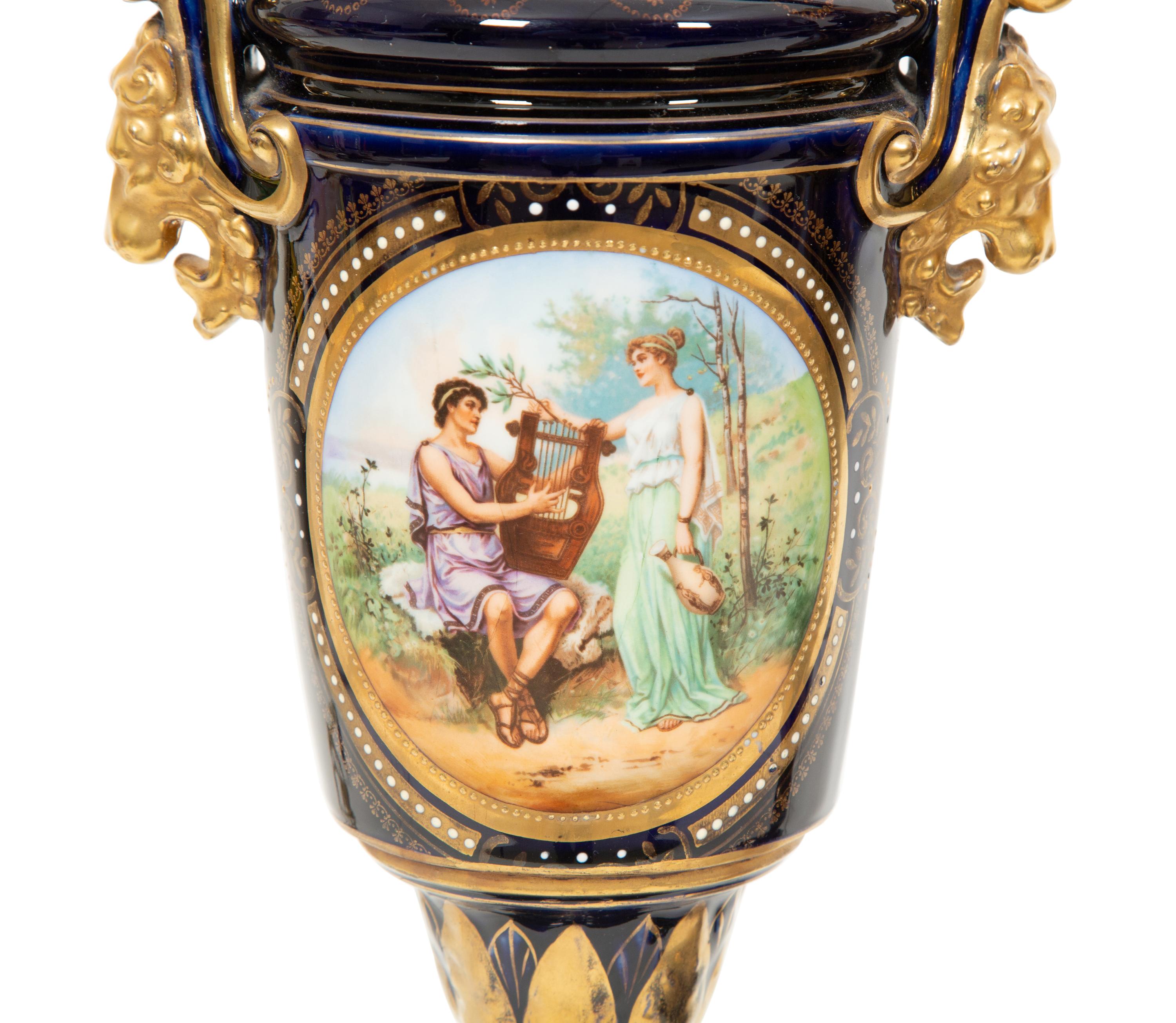 A Pair of Sèvres Style Porcelain Urns Mounted as Lamps