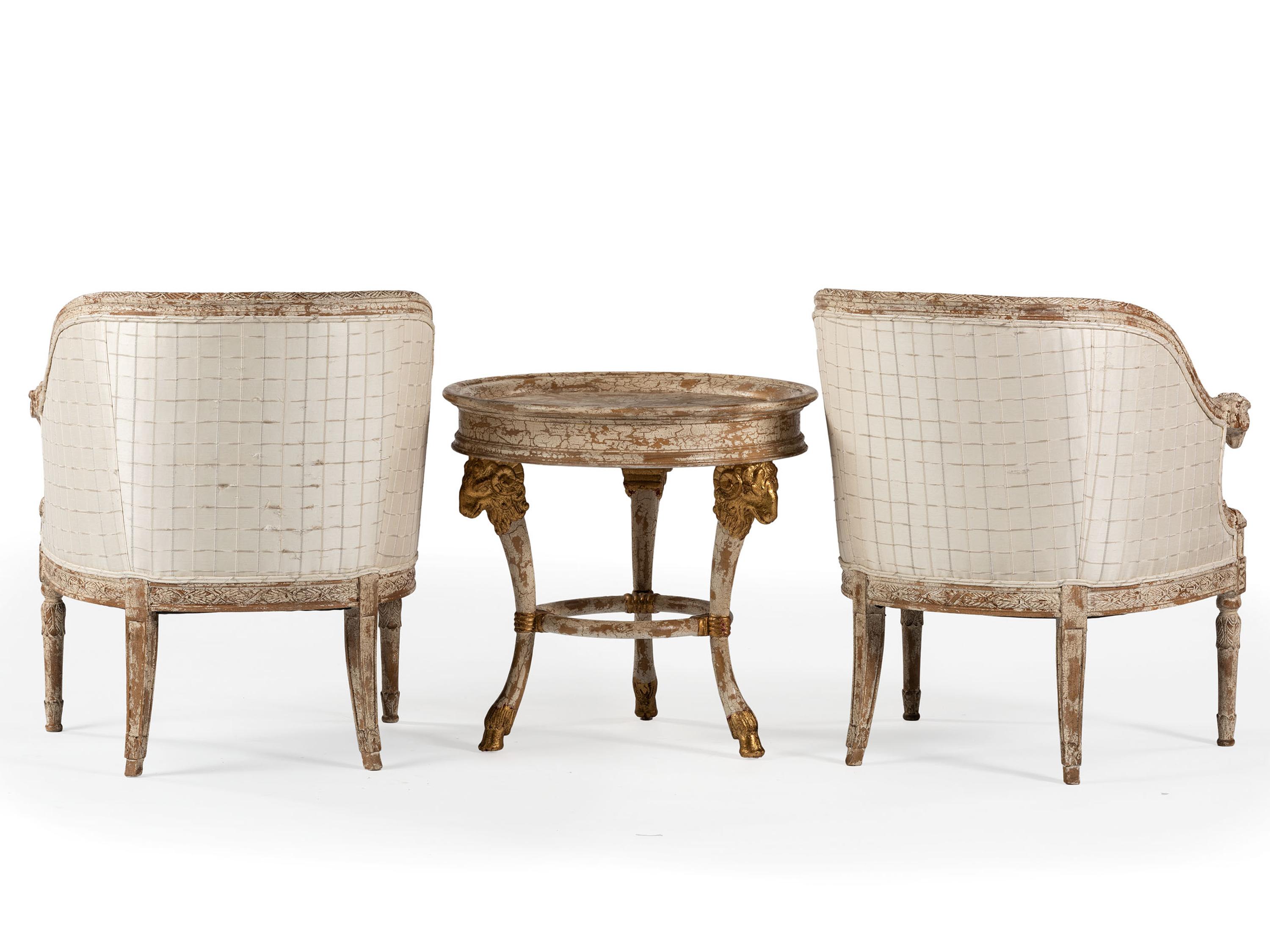 A Pair of Louis XVI-Style Carved and Painted Bergeres and Center Table