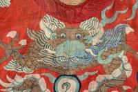 A Red Ground Kesi Woven Silk Theatrcial 'Dragon' Robe