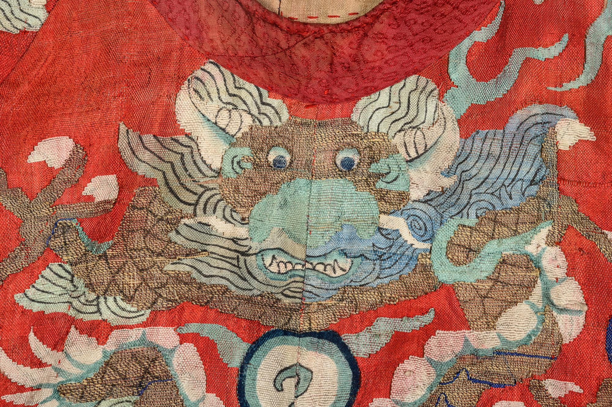 A Red Ground Kesi Woven Silk Theatrcial 'Dragon' Robe
