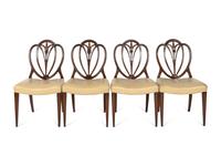 A Mahogany Dining Table and An Associated Set of Eight Mahogany Chairs