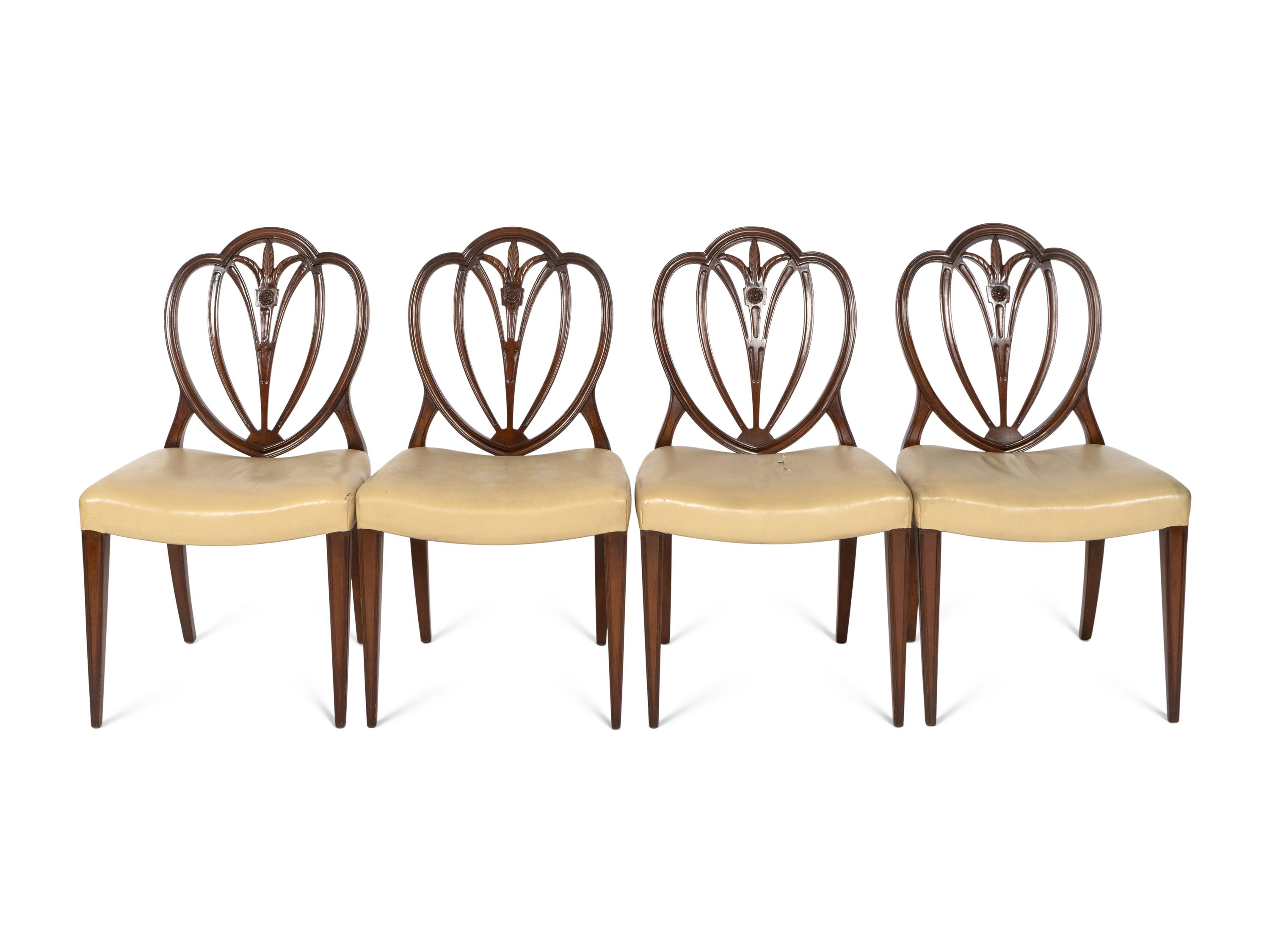 A Mahogany Dining Table and An Associated Set of Eight Mahogany Chairs
