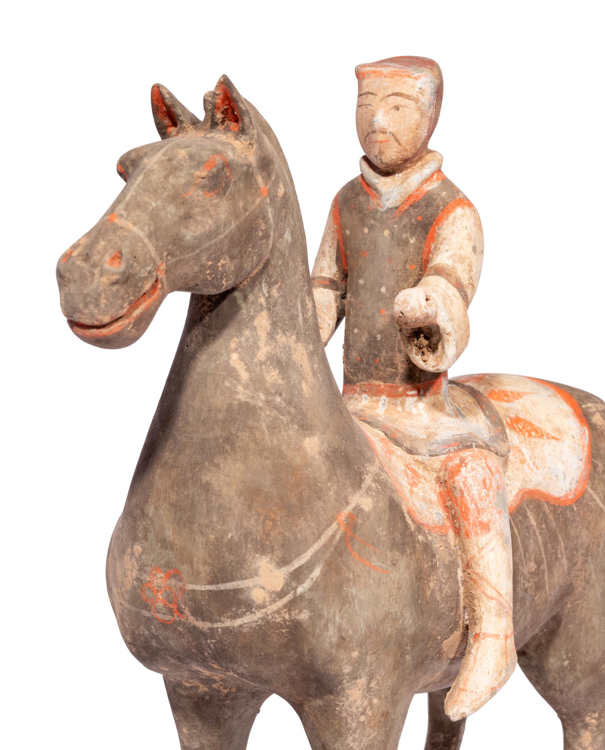 A Chinese Painted Pottery Equestrian Figure