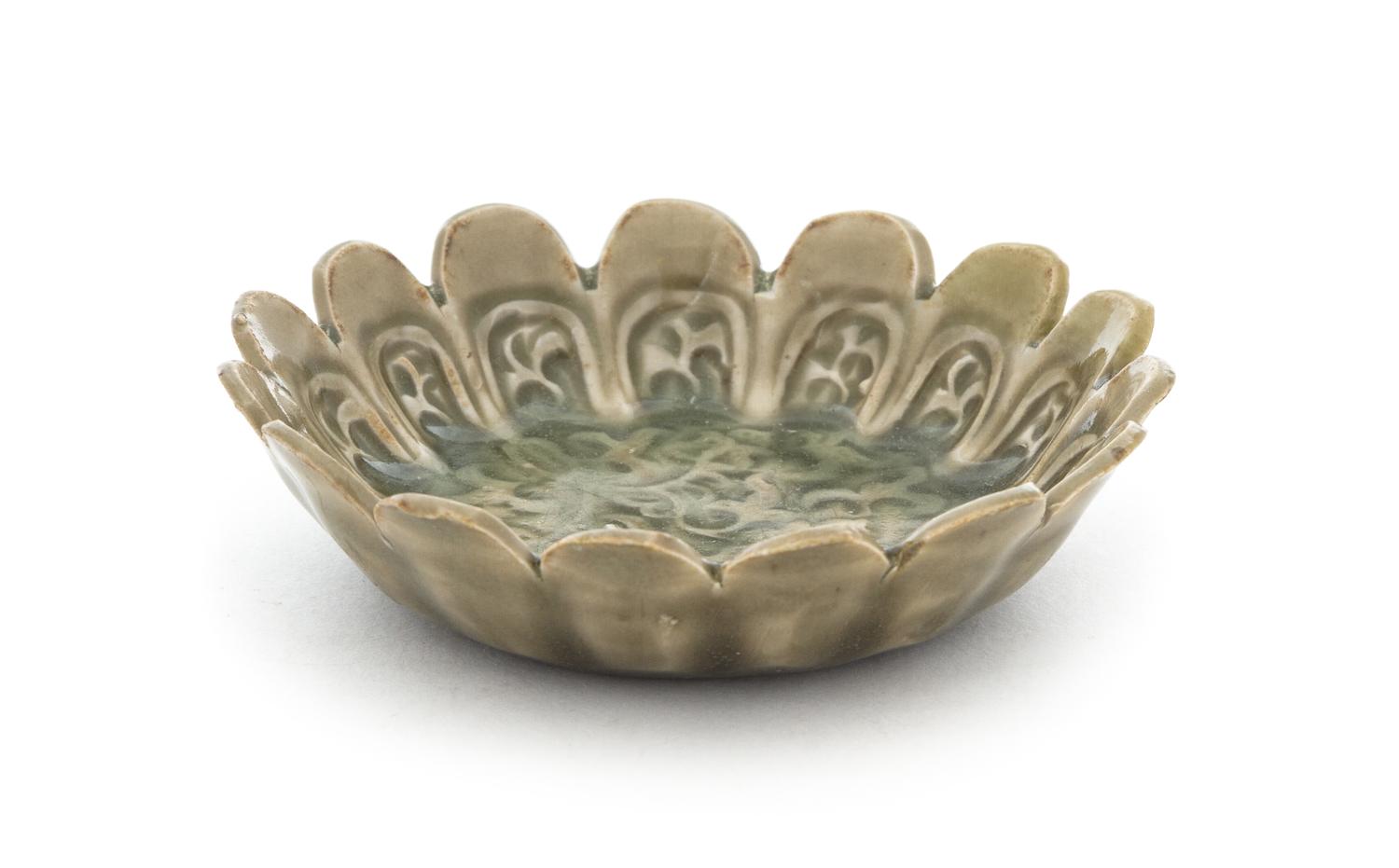 A Small Yaozhou Celadon Glazed Porcelain Dish Diameter 3 3/4 inches.