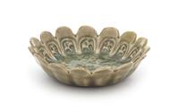 A Small Yaozhou Celadon Glazed Porcelain Dish Diameter 3 3/4 inches.