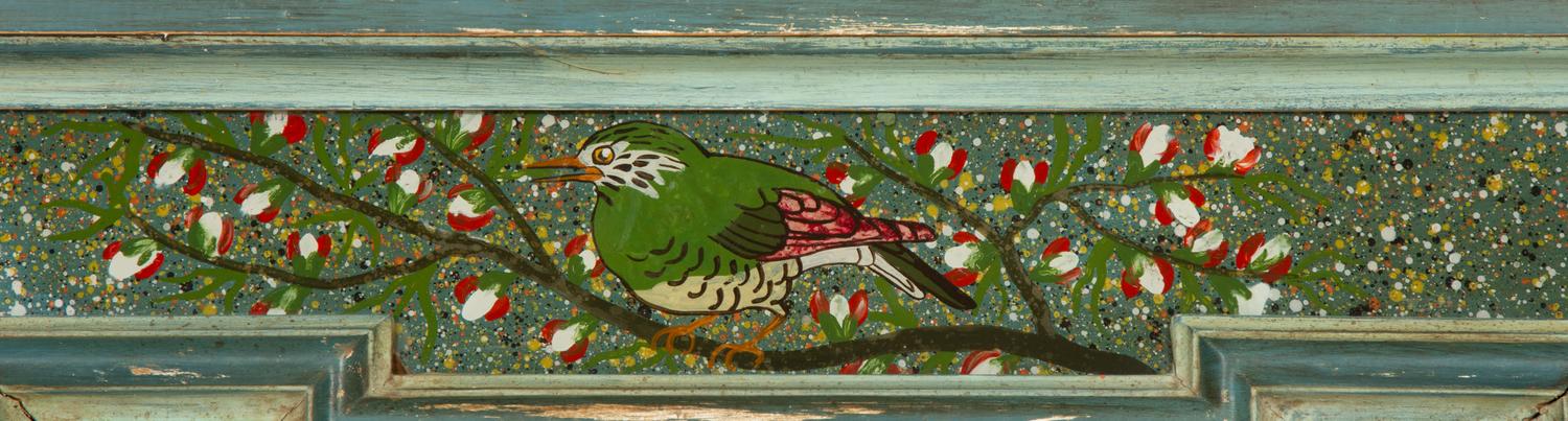 A Painted Molded Wood Framed Mirror with Reverse Painted Glass Panels Depicting Birds in Foliage