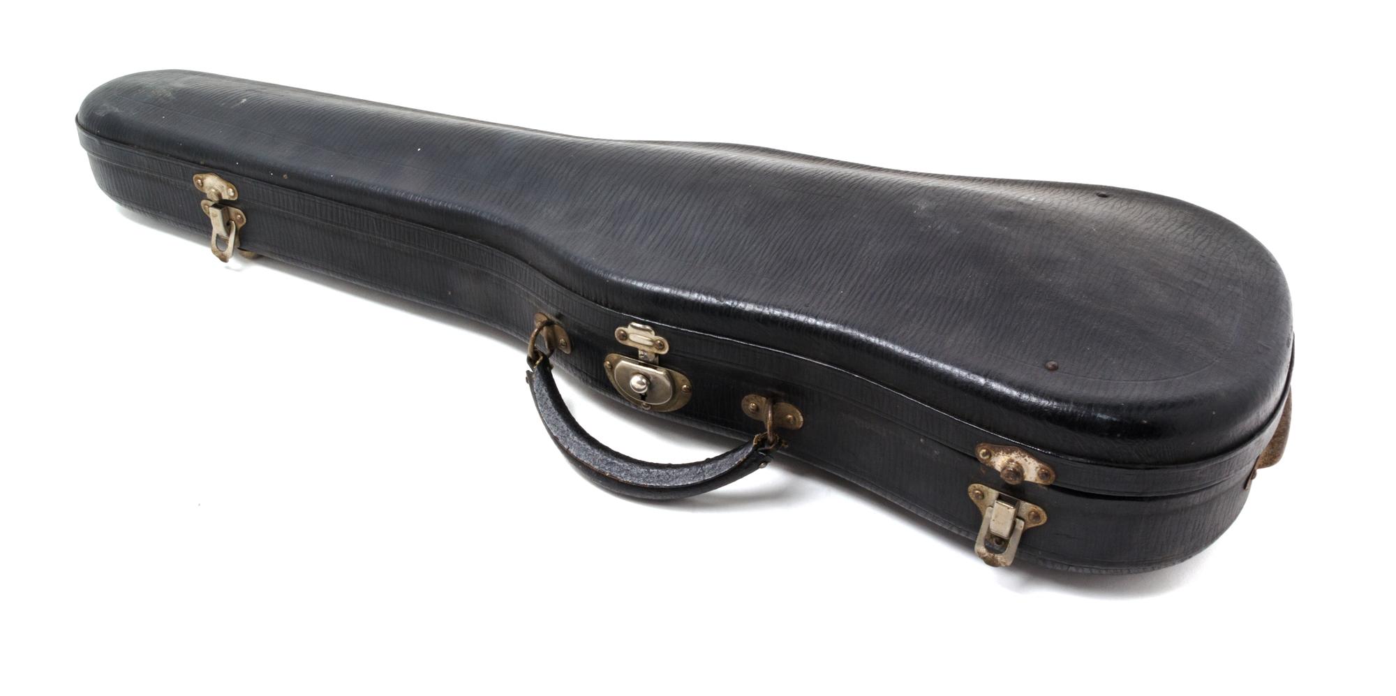 A Cased German Violin Length 23 3/4 inches.