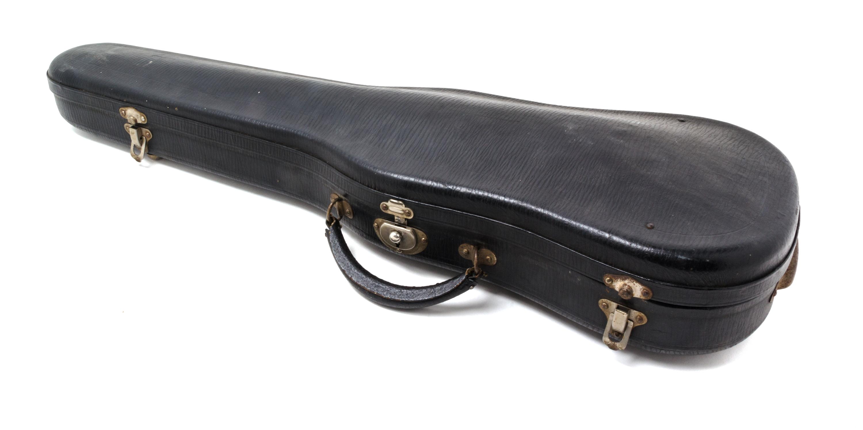 A Cased German Violin Length 23 3/4 inches.