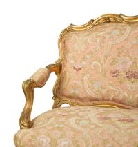 A Louis XV Style Giltwood Sofa and Pair of Fauteuils — EARLY 20TH CENTURY
