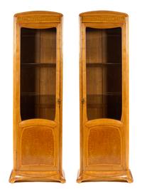 A Pair of French Art Nouveau Oak and Birch Display Cabinets, Louis Majorelle Height 84 x width 25 1/4 x depth 15 1/4 inches.
