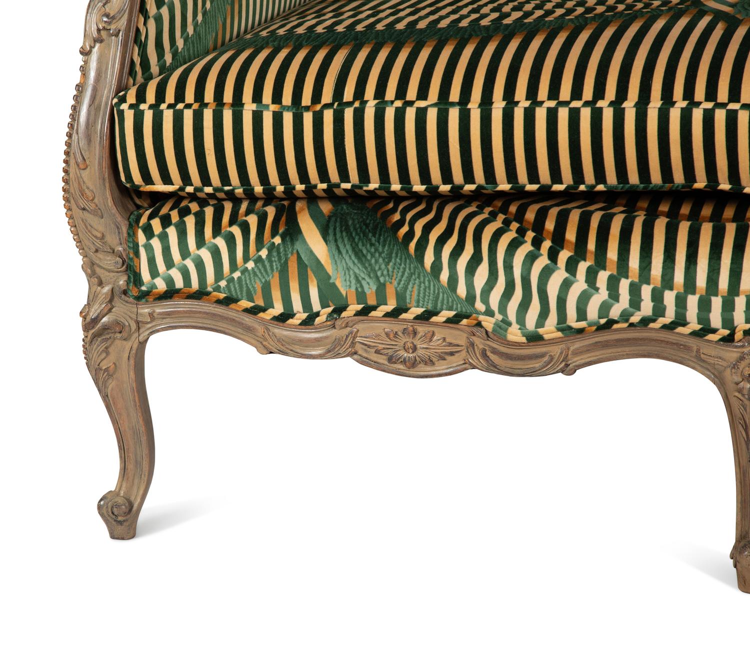 A Louis XV Style Carved and Stained Mahogany Sofa