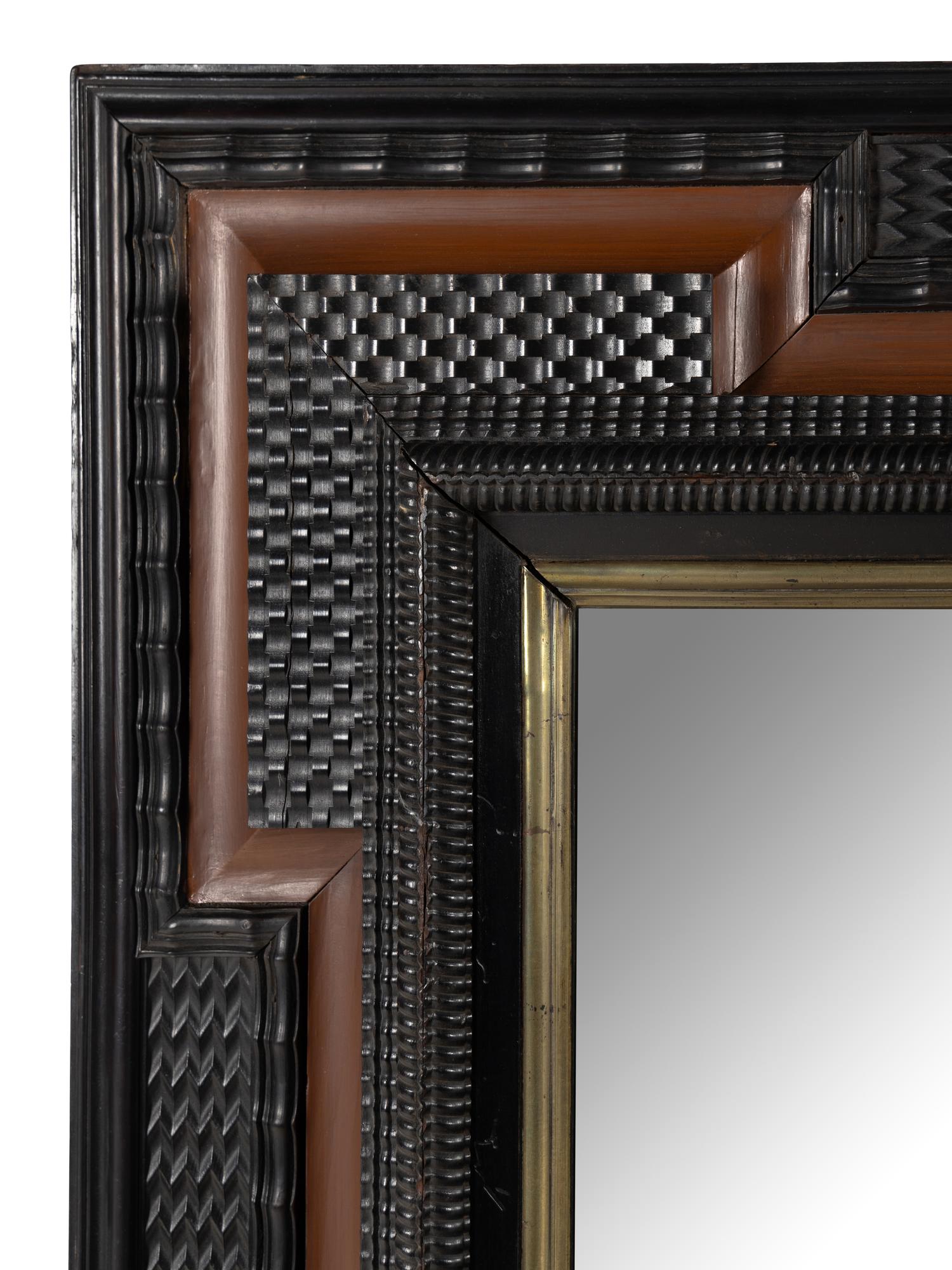 A Flemish Part-Ebonized Mirror