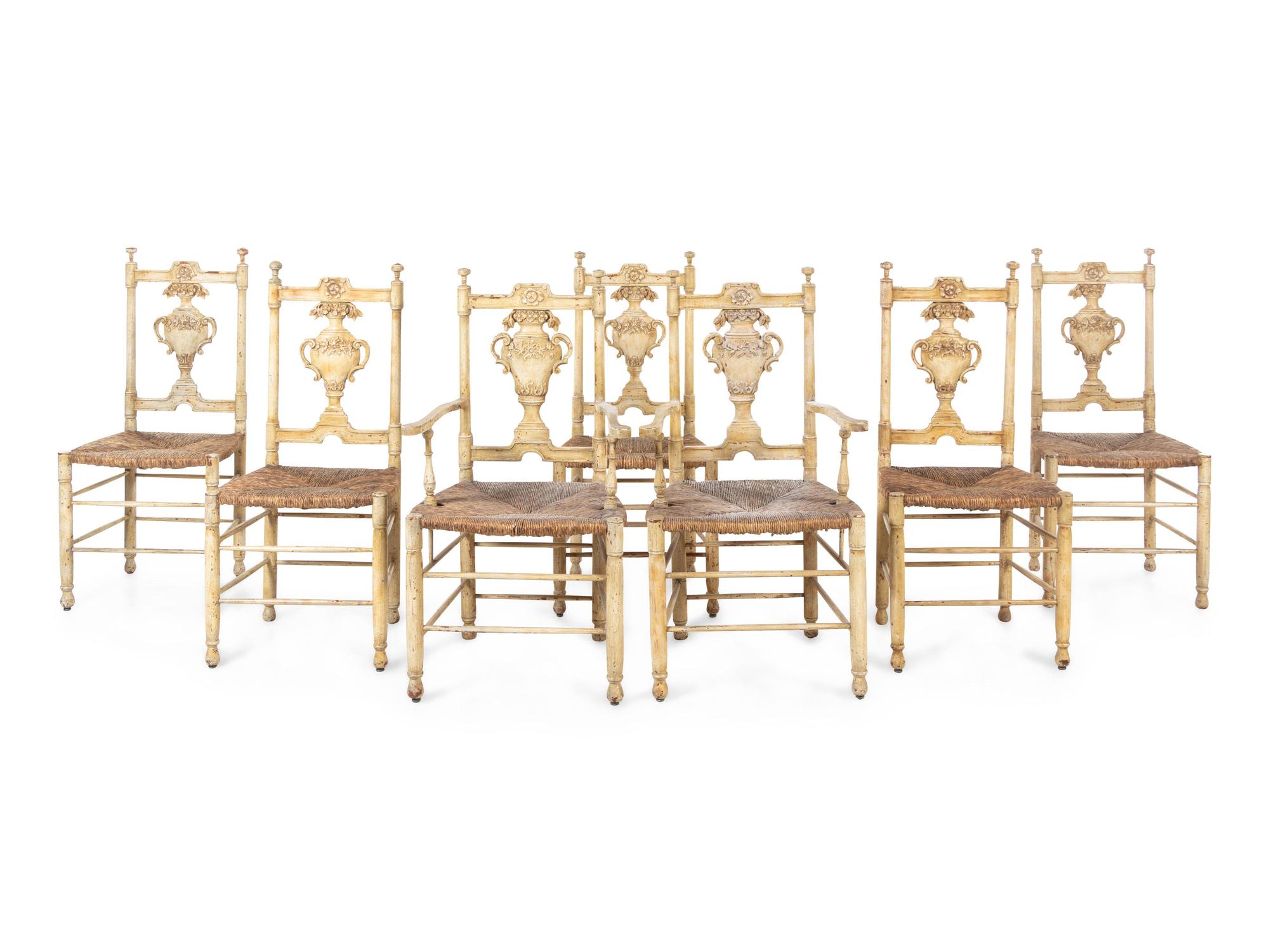 A Set of Seven French Provincial Painted Chairs