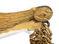 Ornate privately purchased brass eagle spurs.