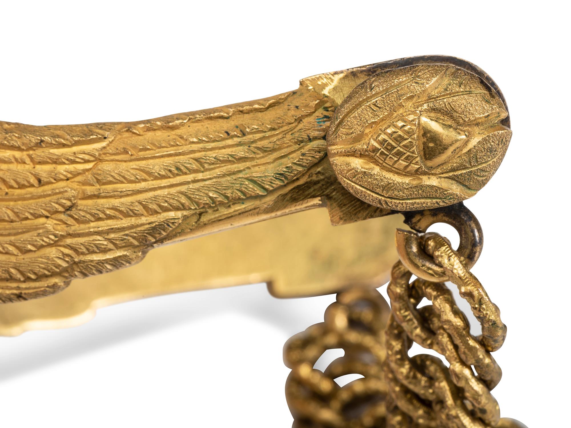 Ornate privately purchased brass eagle spurs.
