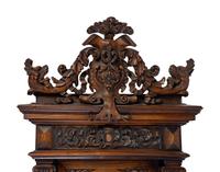 A Renaissance Revival Carved Walnut Regulator Clock