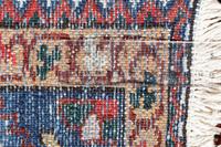 A Heriz Wool Rug