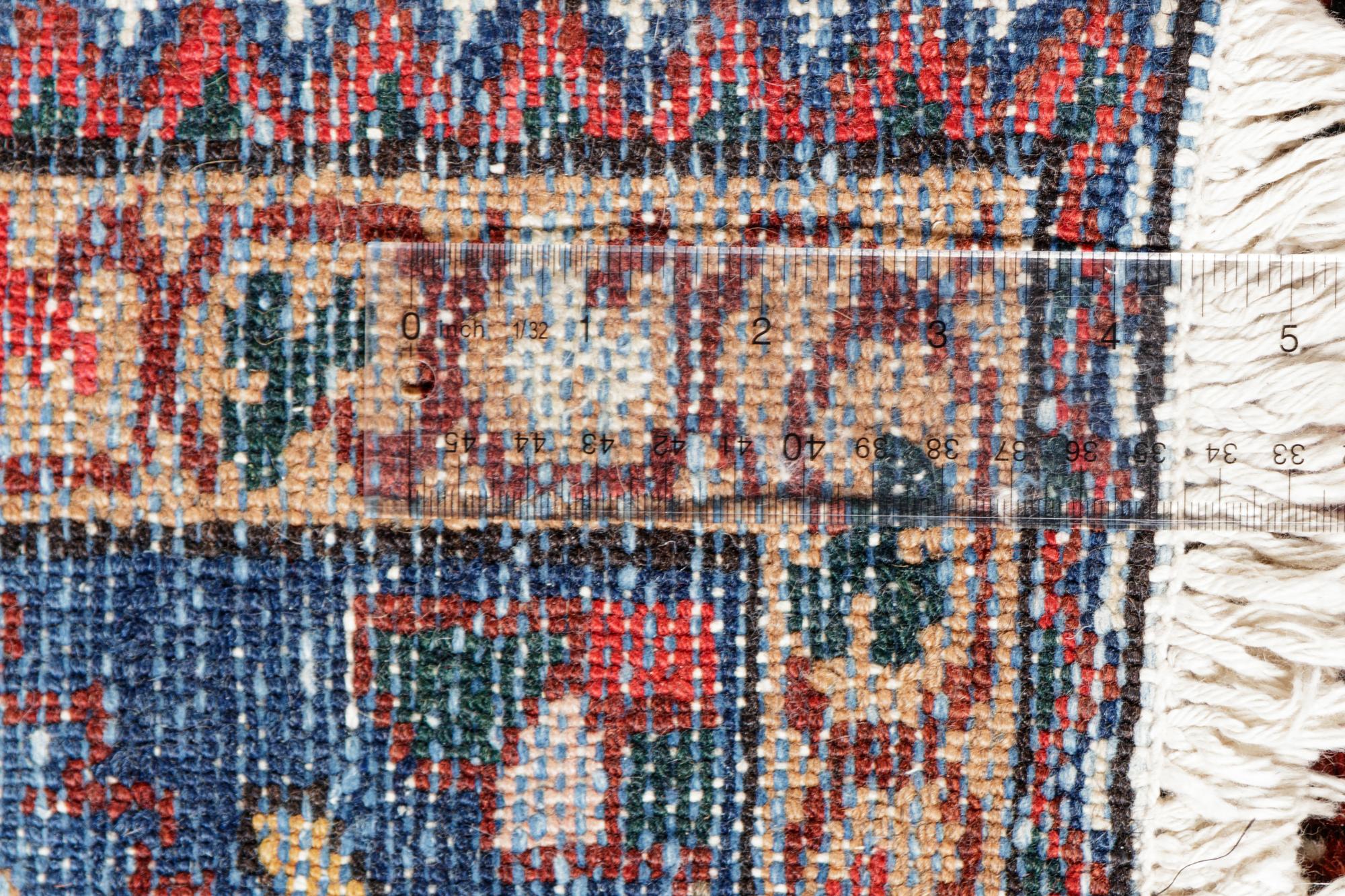 A Heriz Wool Rug