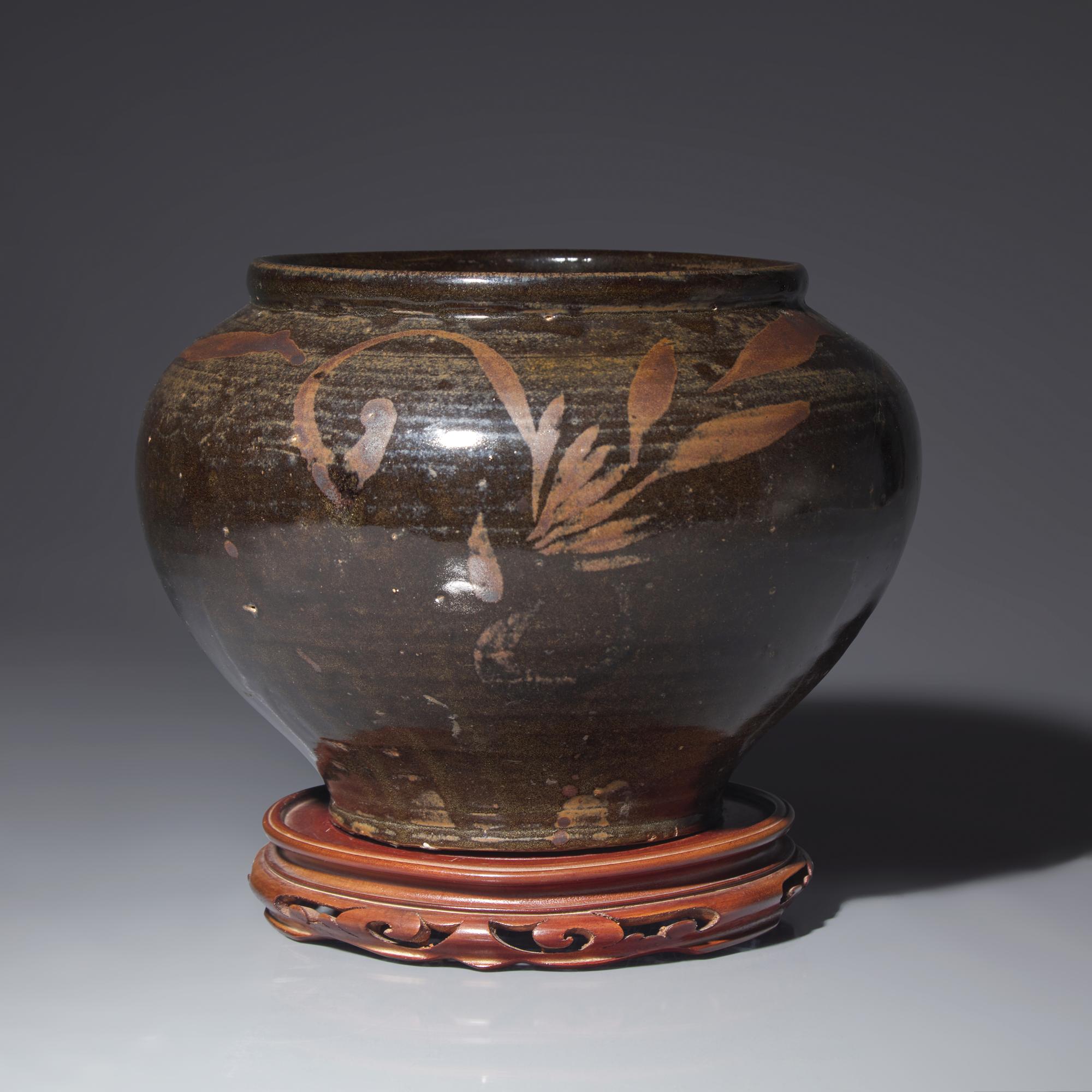 A Chinese Black Glazed Wide-Mouthed 'Guan' Jar, Jin/Yuan Dynasty or Later — 金/元或更晚 黑釉花卉紋敞口罐