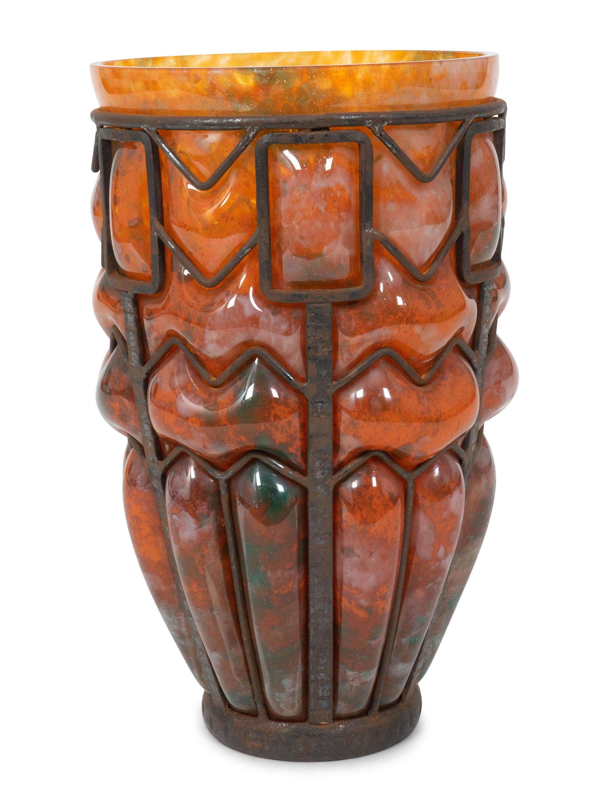 An Unsigned Daum Wrought-Iron and Glass Blow-Out Vase — CIRCA 1930