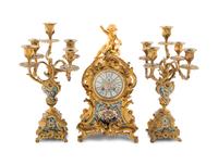 A Louis XV Style Gilt Bronze and Champlevé Enamel Clock Garniture
