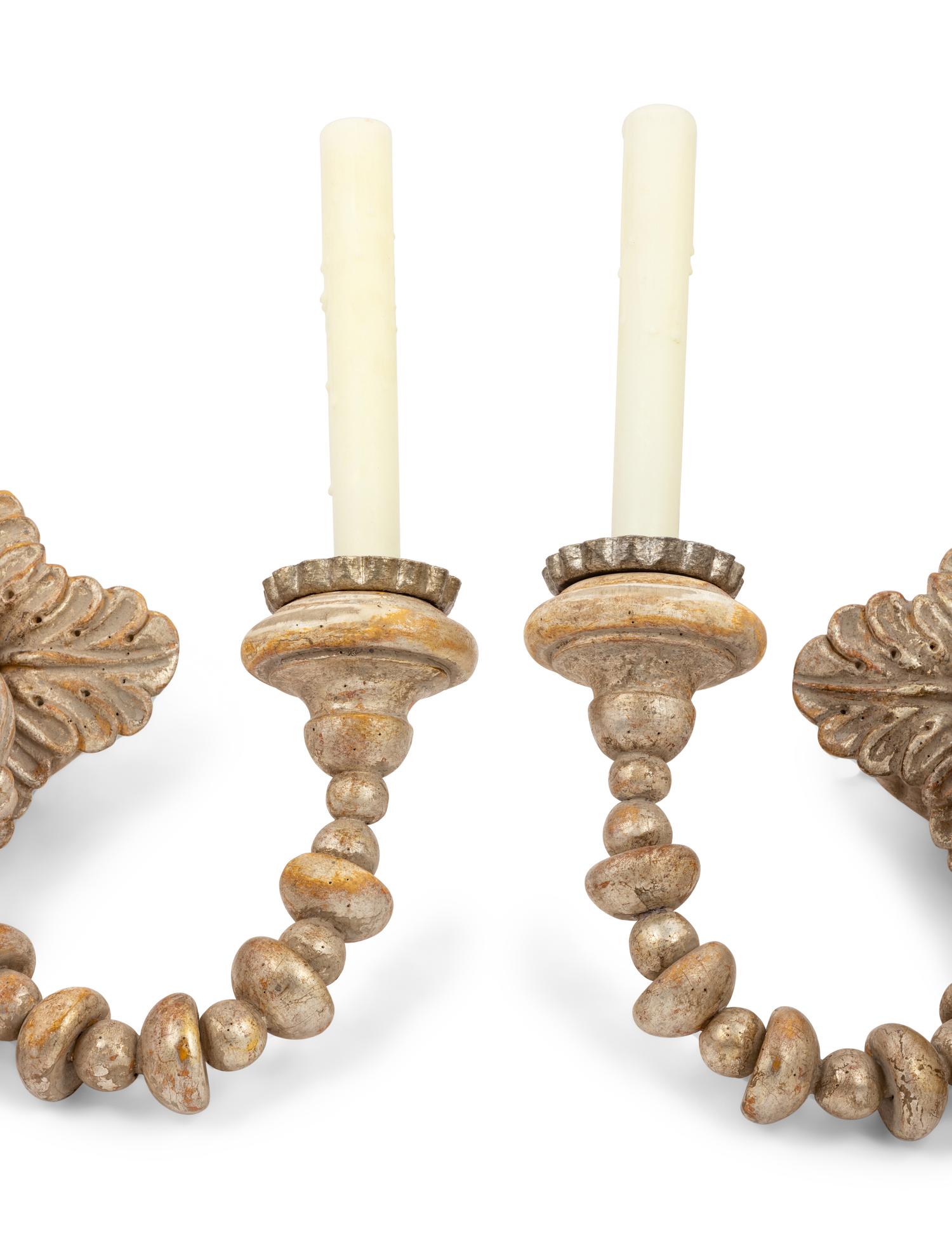 A Pair of Continental Silvered Wood Two-Light Sconces