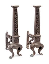 A Pair of English Aesthetic Movement Cast Iron Andirons