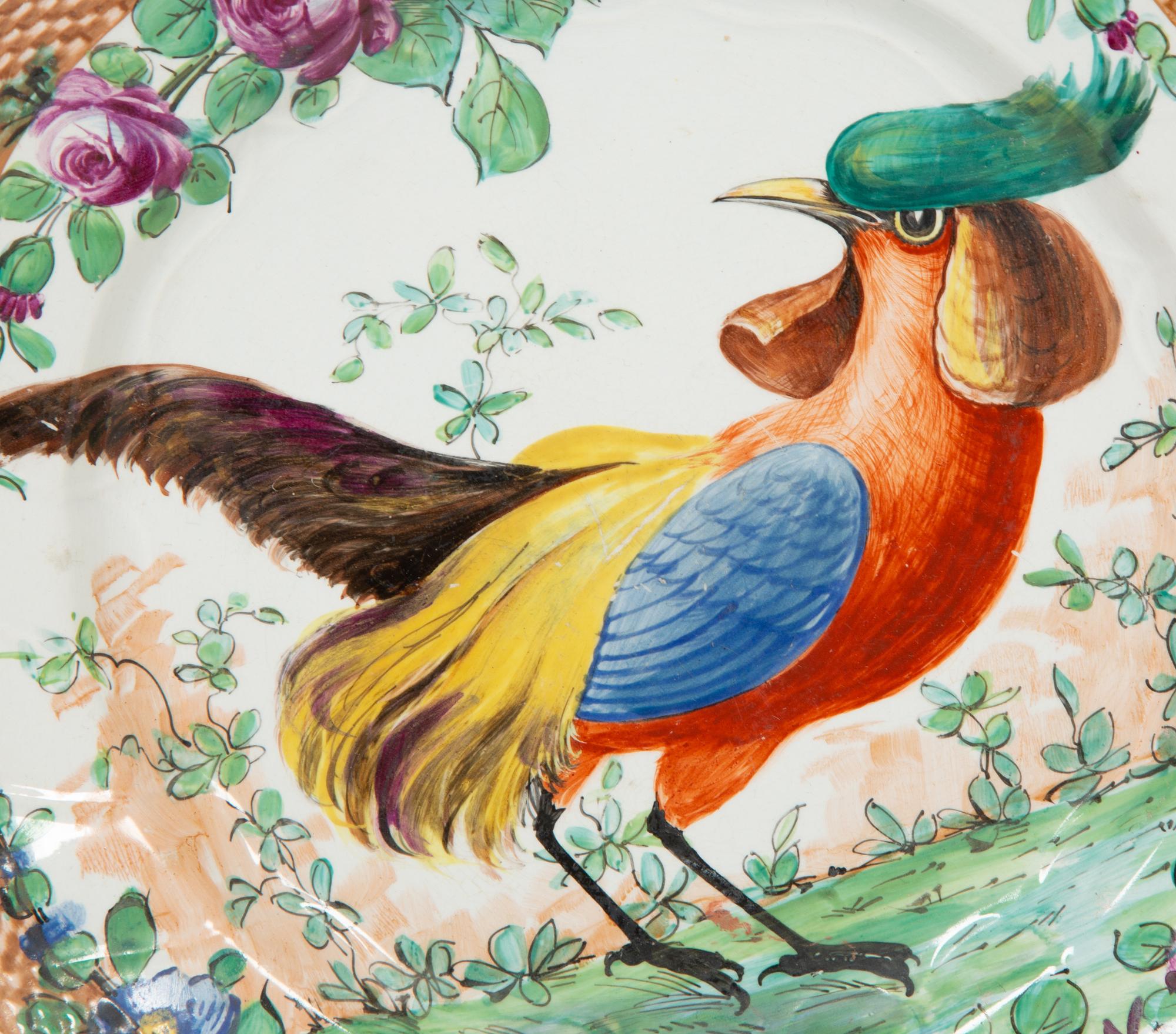 A Pair of Porcelain Plates Painted with Exotic Birds