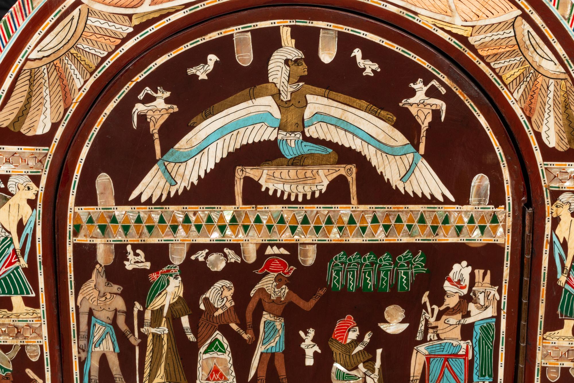 A Pair of Egyptian Style Painted and Inlaid Cabinets