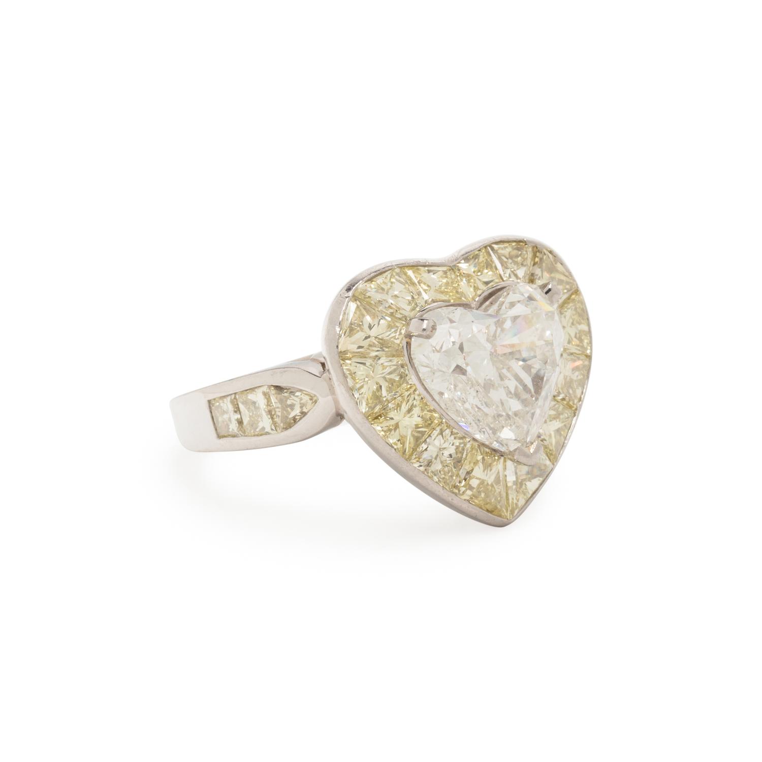 OSCAR HEYMAN, HEART SHAPED DIAMOND AND YELLOW DIAMOND RING