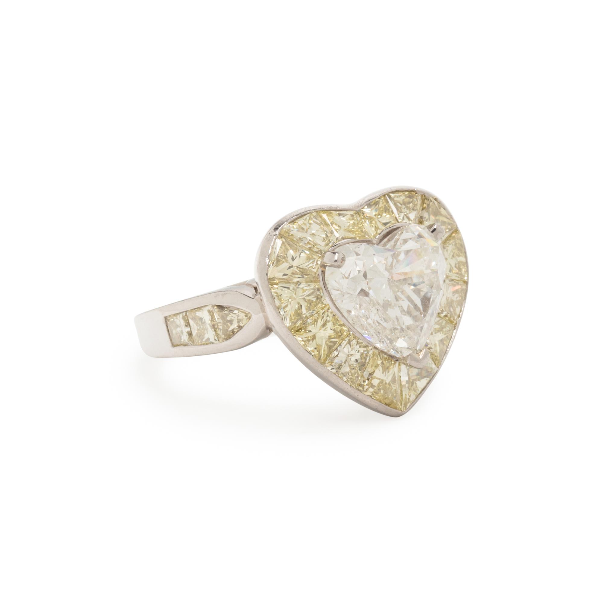OSCAR HEYMAN, HEART SHAPED DIAMOND AND YELLOW DIAMOND RING