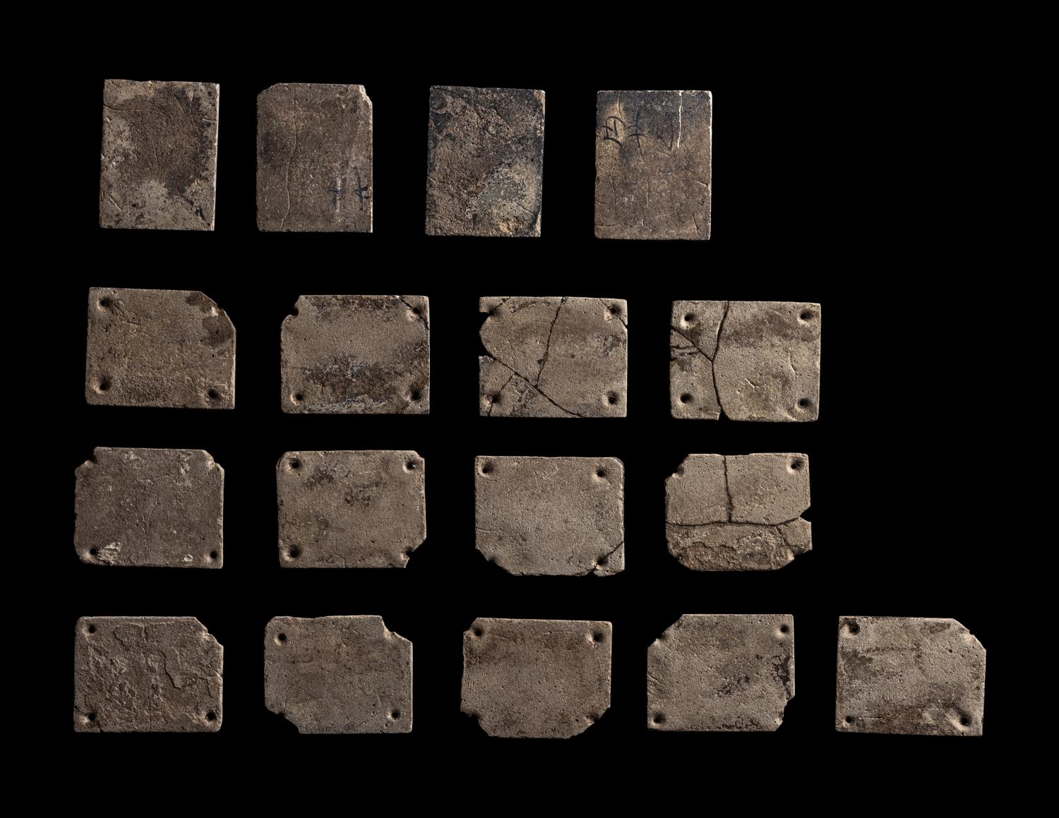 A Set of 17 Chinese Calcified Jade Plaques