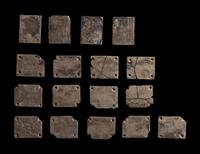 A Set of 17 Chinese Calcified Jade Plaques