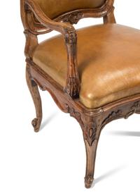 A Pair of French Provincial Carved Walnut Armchairs