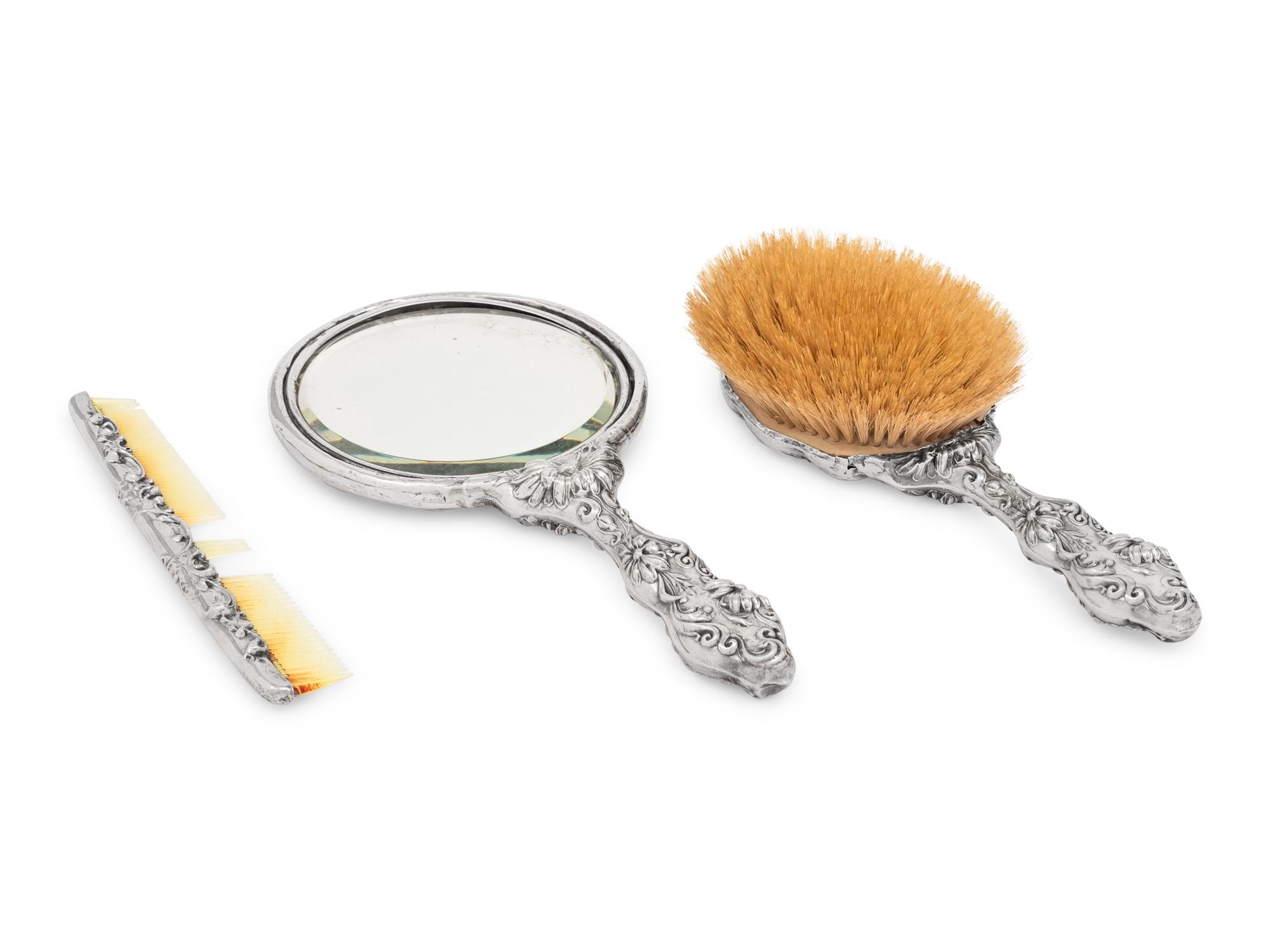 A Silver Three-Piece Dresser Set